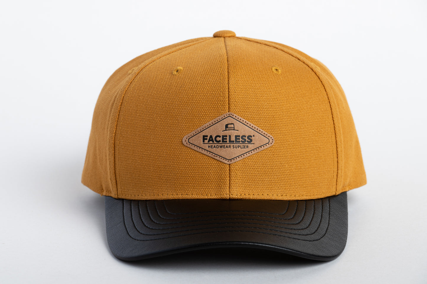 GORRA FACELESS - CAMEL TOPBOY